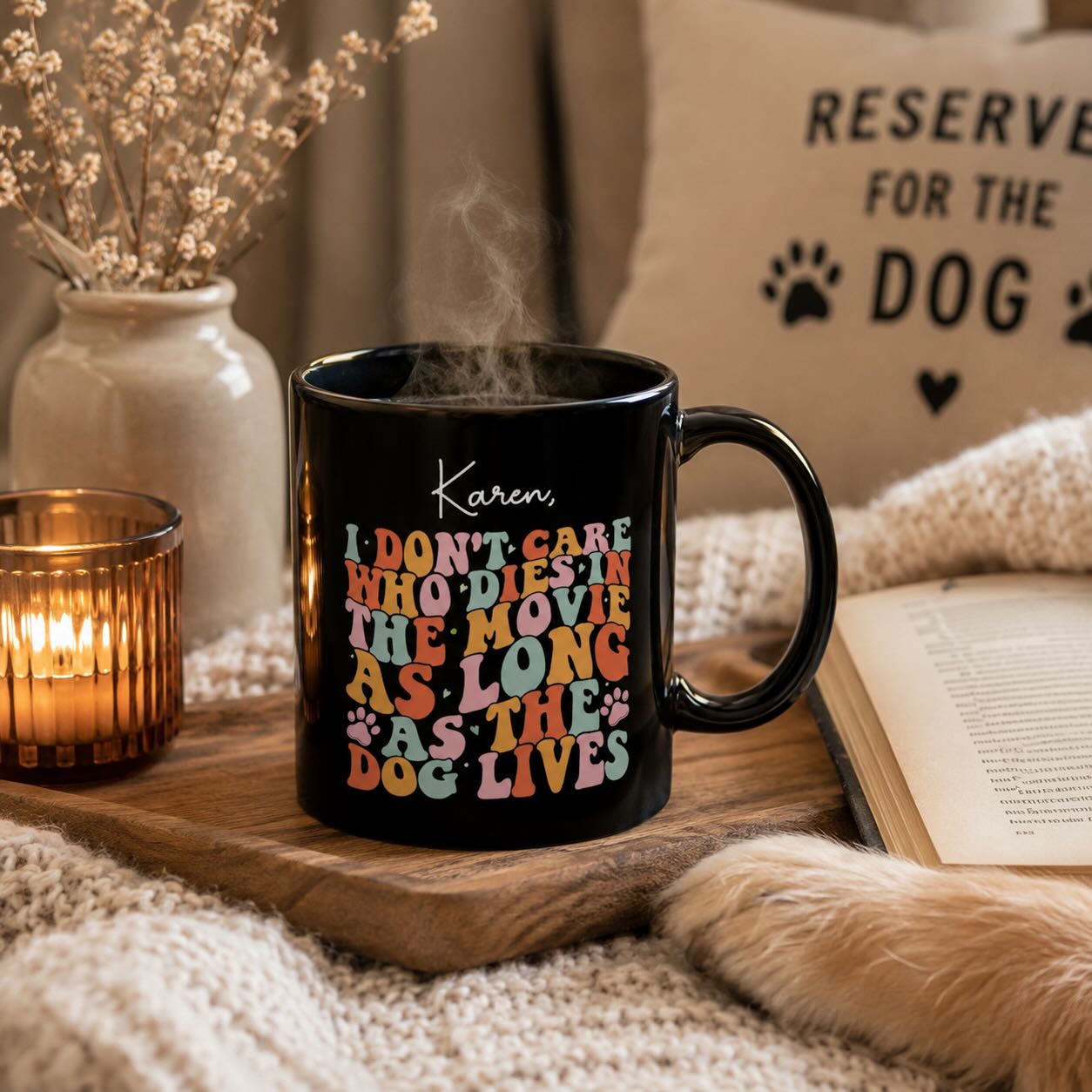 As Long As the Dog Lives black mug personalized with name, styled with candle, book, and dried flowers