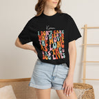 Woman on sofa wearing funny dog lover T-shirt with custom name