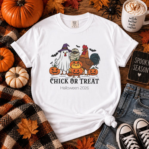 Boy wearing Chick or Treat Halloween t-shirt, side view