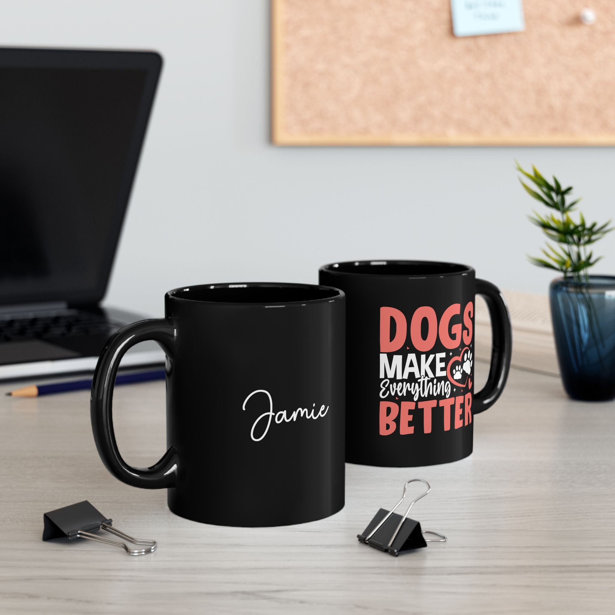 Dogs Make Everything Better black mug on desk