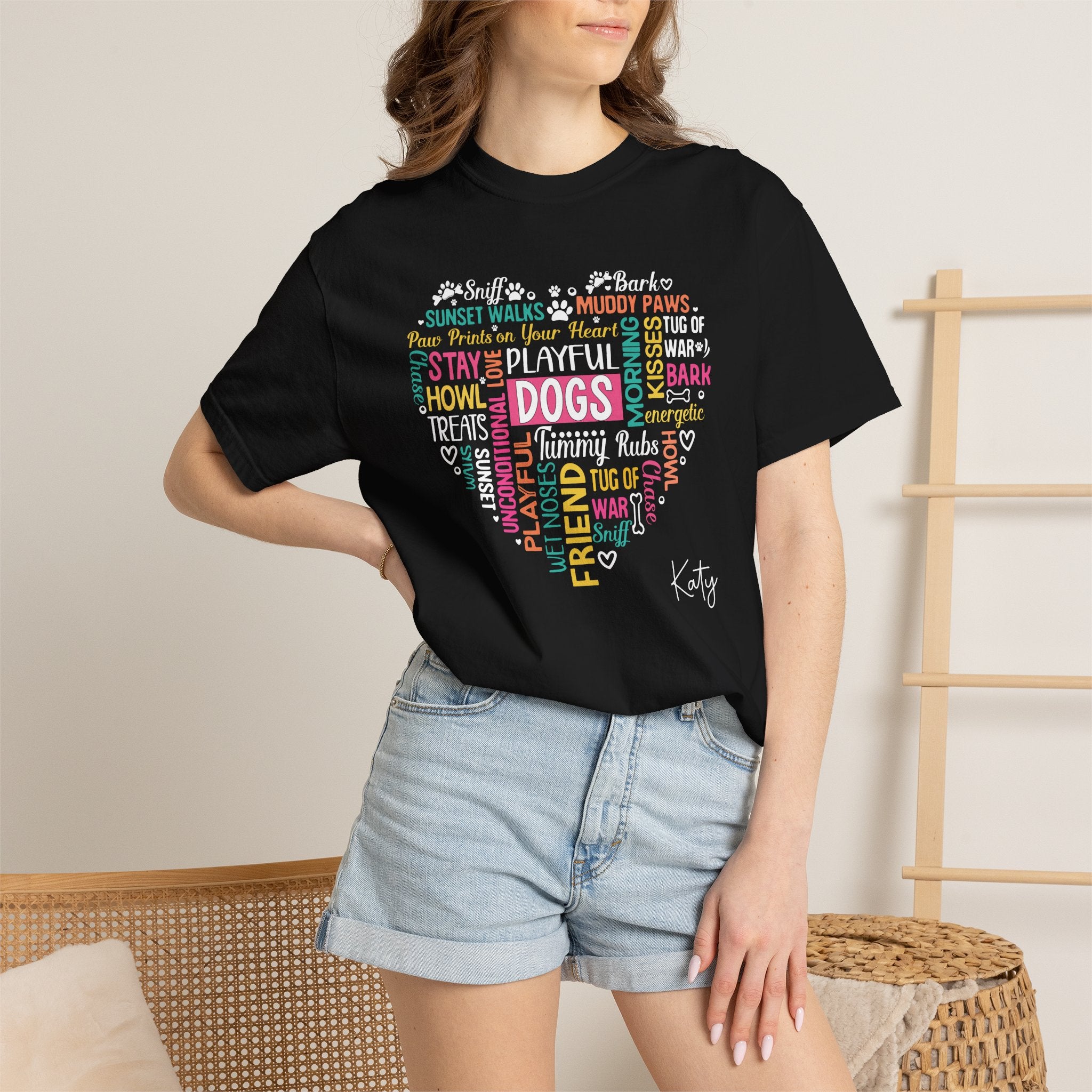 Woman wearing personalised Dogs word heart T-shirt - standing lifestyle photo