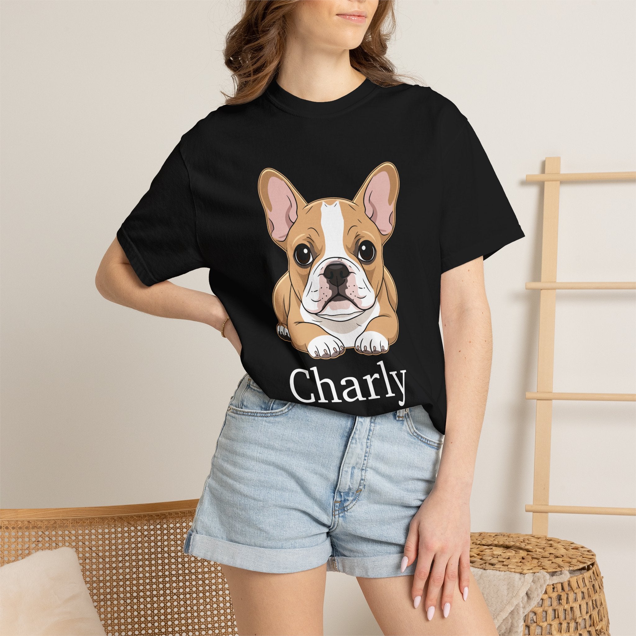 Close-up of Frenchie illustration and dog name on black T-shirt