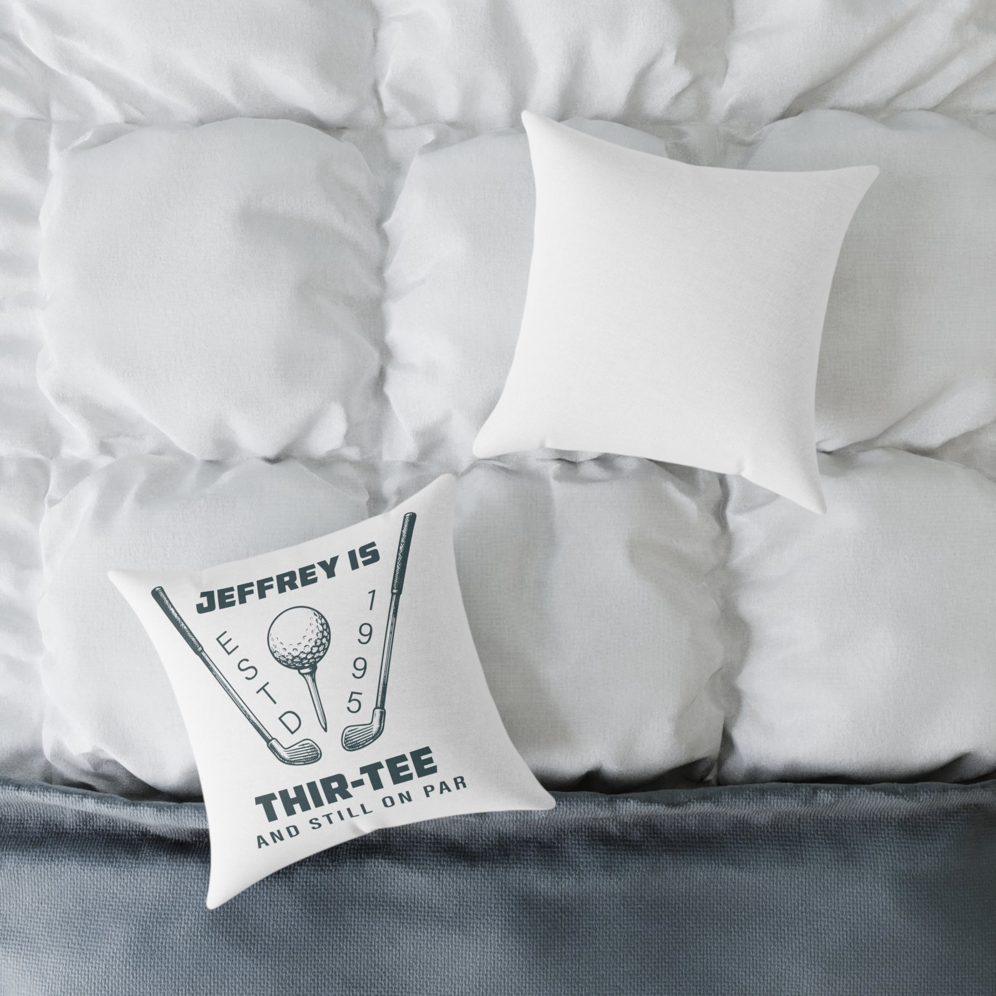 Close-up of custom name and birth year on golf pillow design