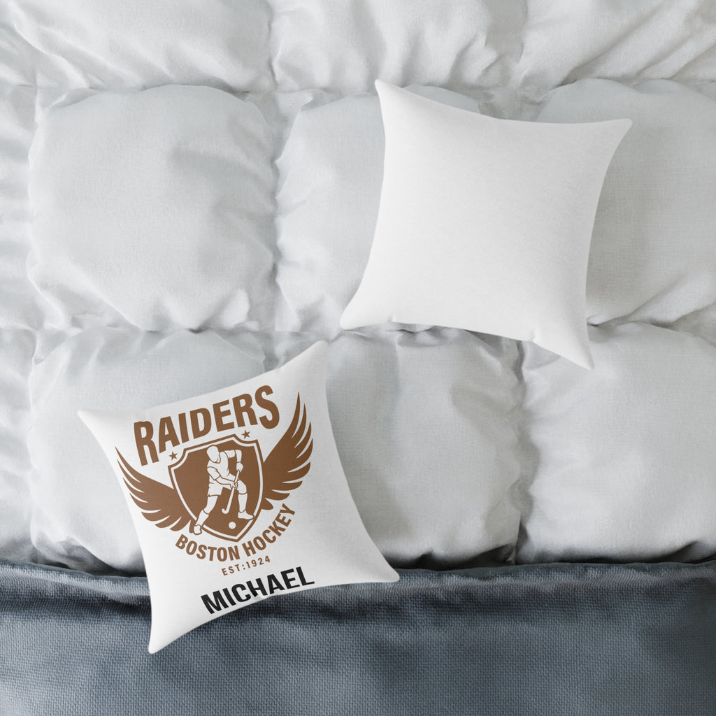 Close-up of custom name and Raiders crest detail on hockey pillow