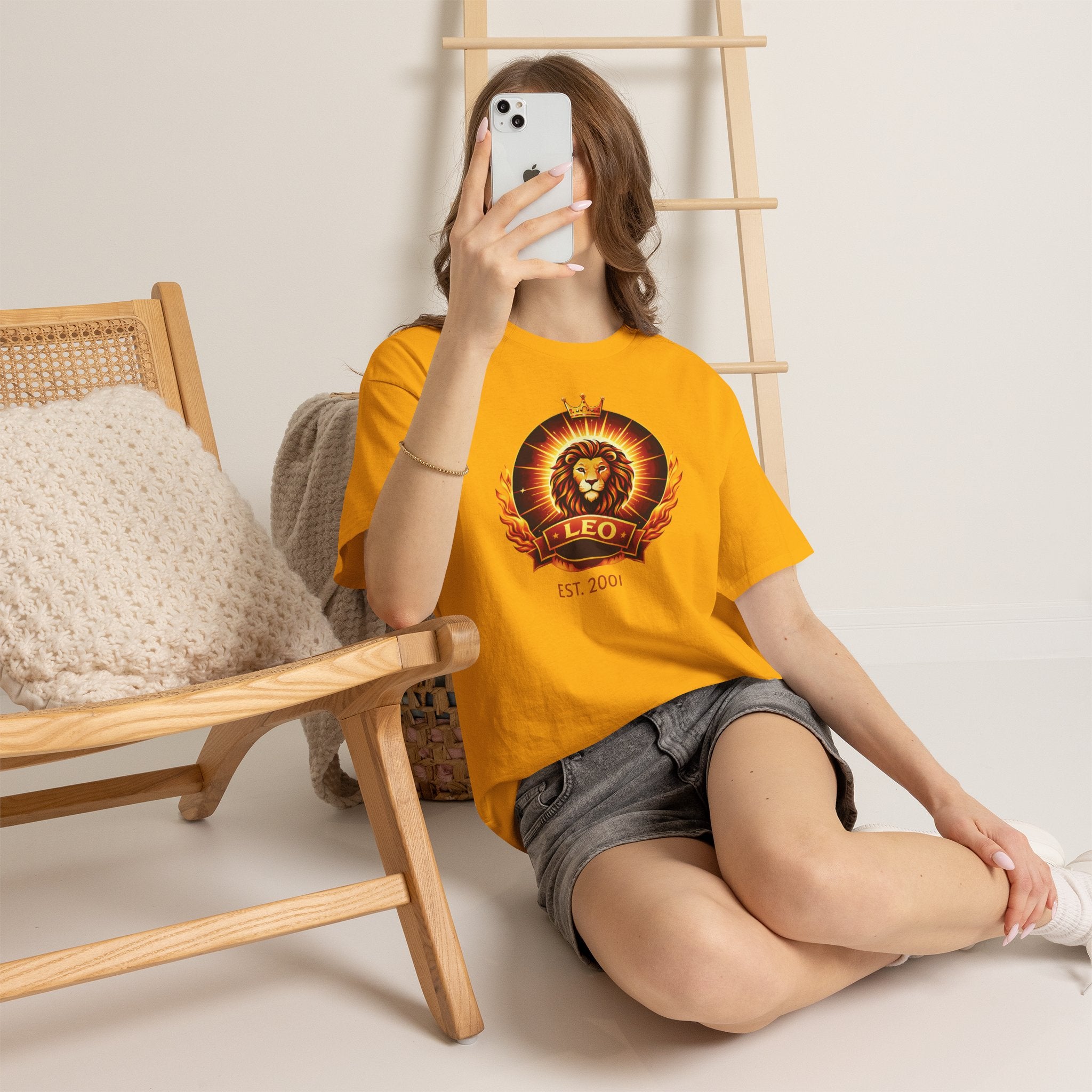 Close-up of personalized EST. year text on Leo zodiac tee