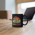Close-up of Mamasaurus retro T-Rex design on personalised black ceramic mug