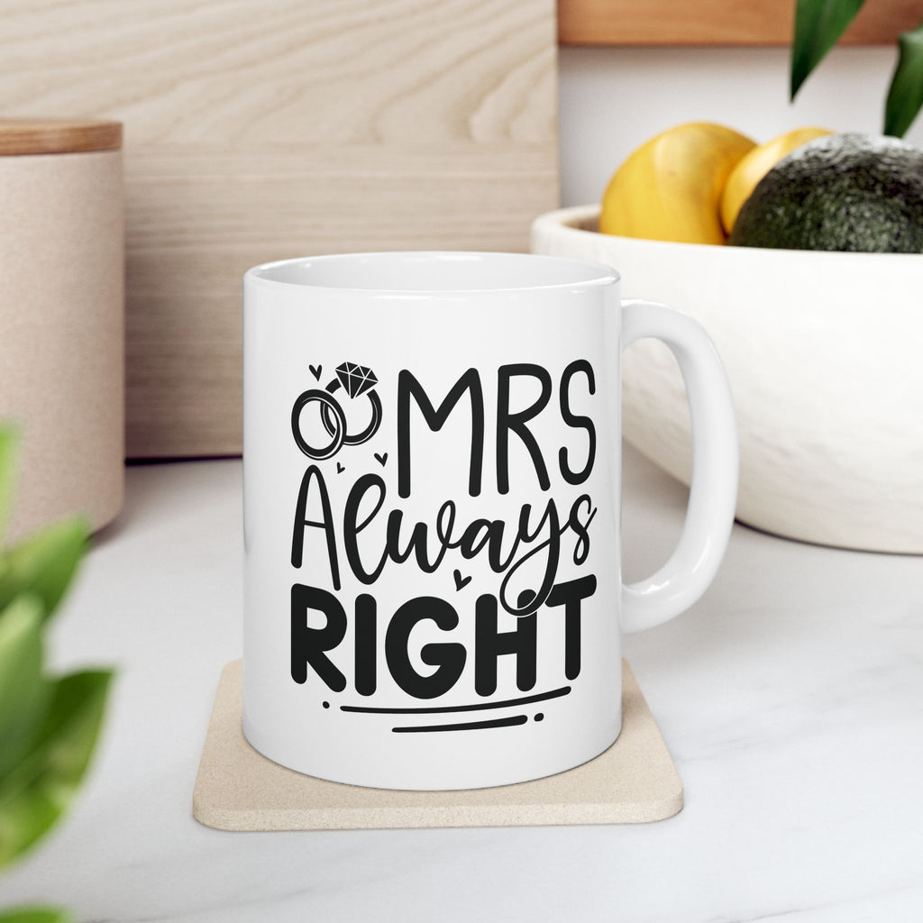 Mrs Always Right mug held in hand for size reference
