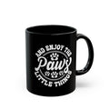 Paws Little Things black mug circular paw print design - front view