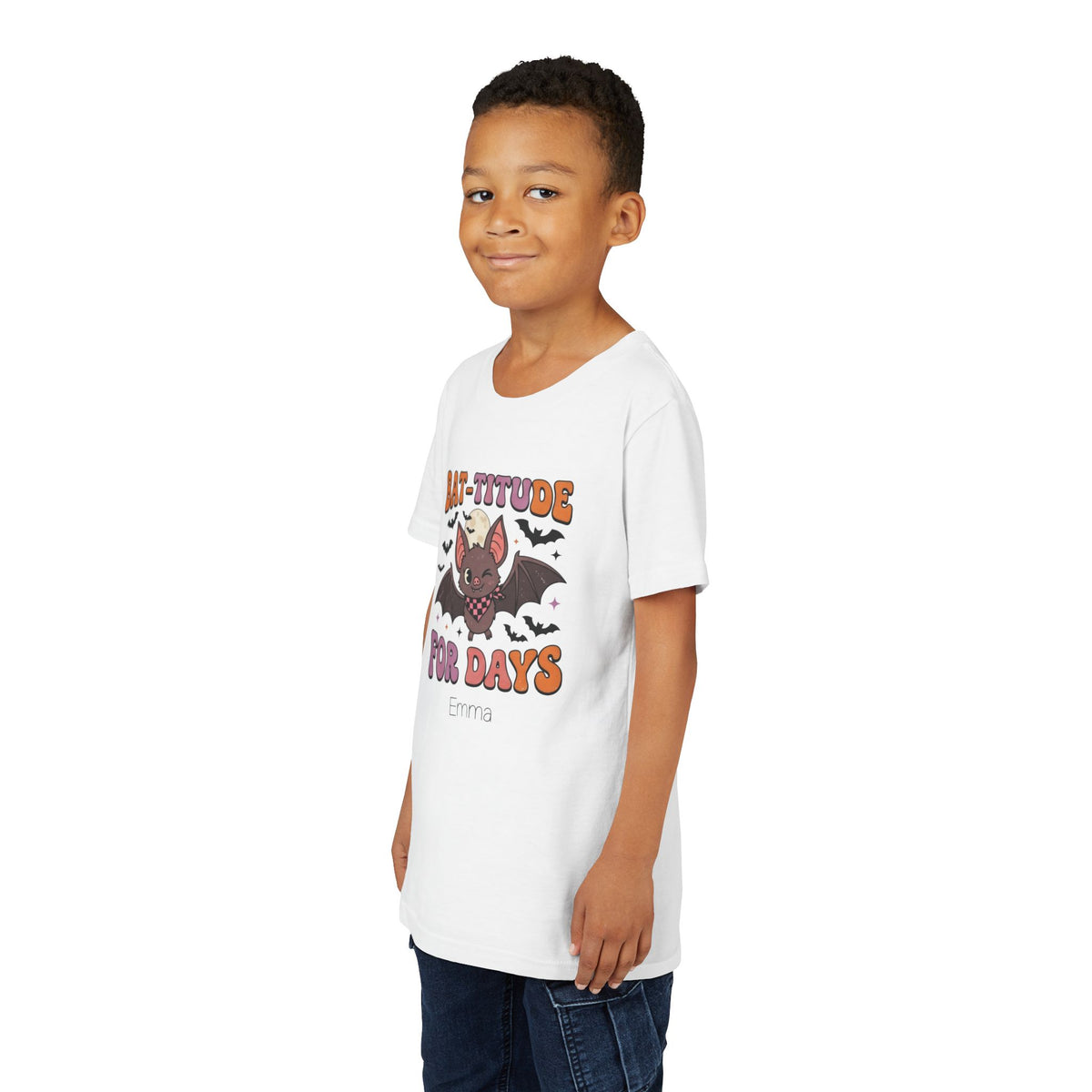 Close-up of bat graphic and custom name on Halloween kids tee