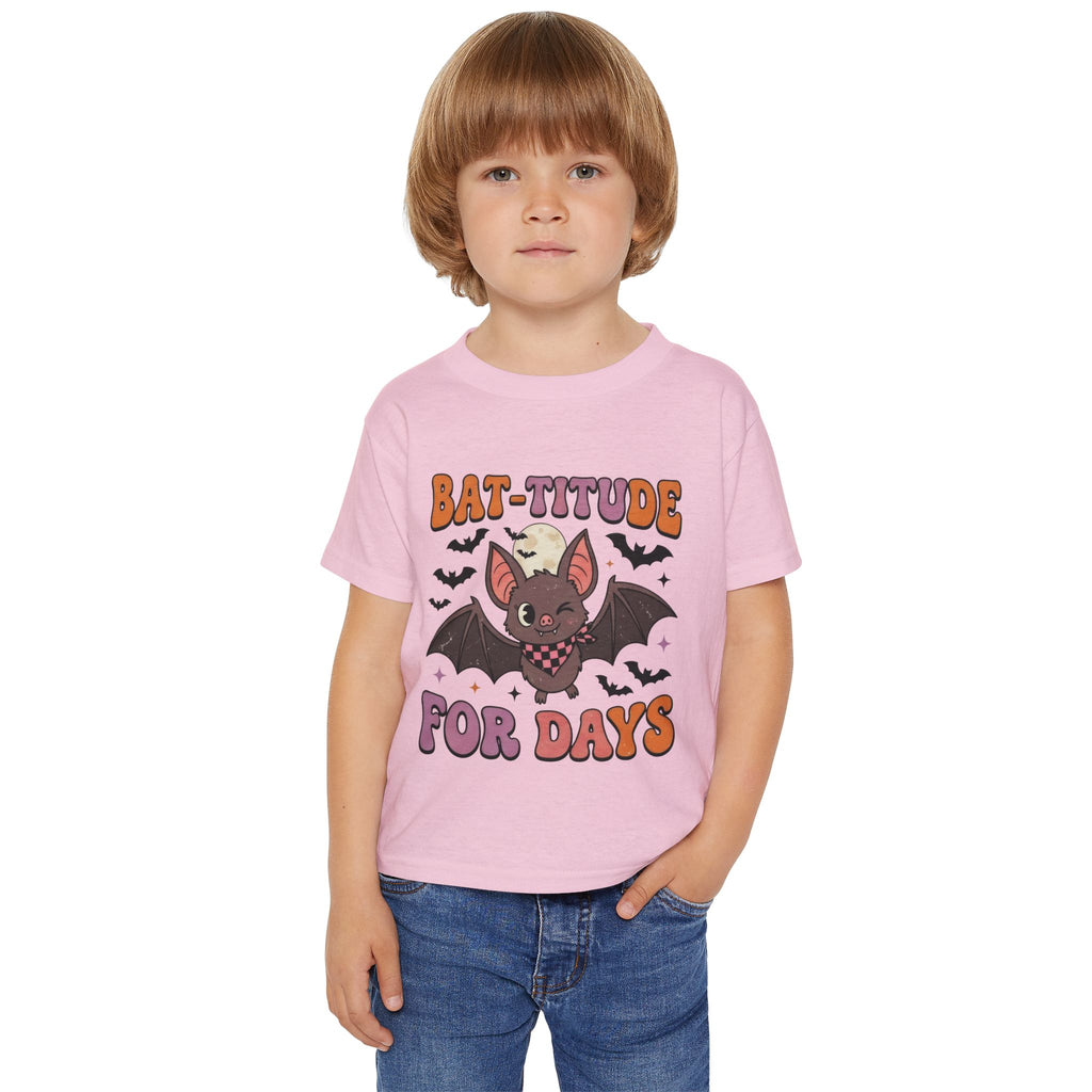 Toddler wearing personalized Bat-titude Halloween t-shirt, side view