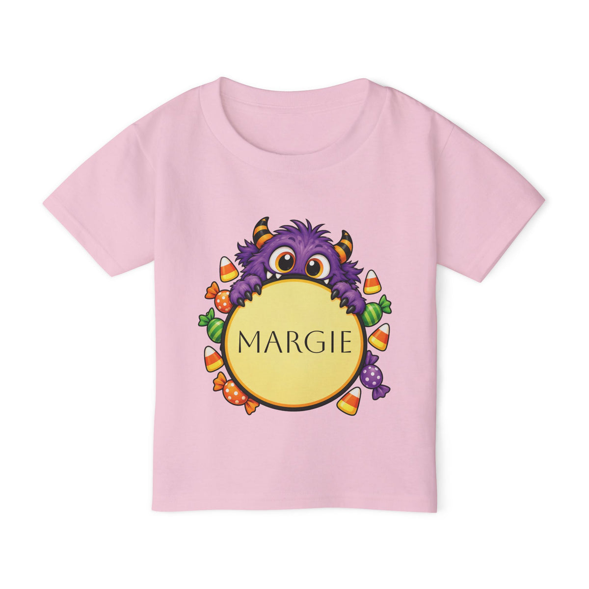 Close-up of candy monster graphic with custom name on toddler tee