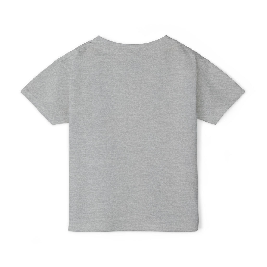 Toddler wearing personalized candy monster Halloween t-shirt, side view