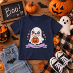 Toddler wearing personalized ghost Halloween t-shirt at a Halloween party
