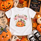 Toddler boy wearing personalized pink pumpkin Halloween t-shirt