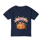Toddler girl wearing personalized pink pumpkin Halloween t-shirt