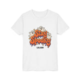 Personalized Stay Spooky Halloween kids t-shirt with custom name, front flat lay