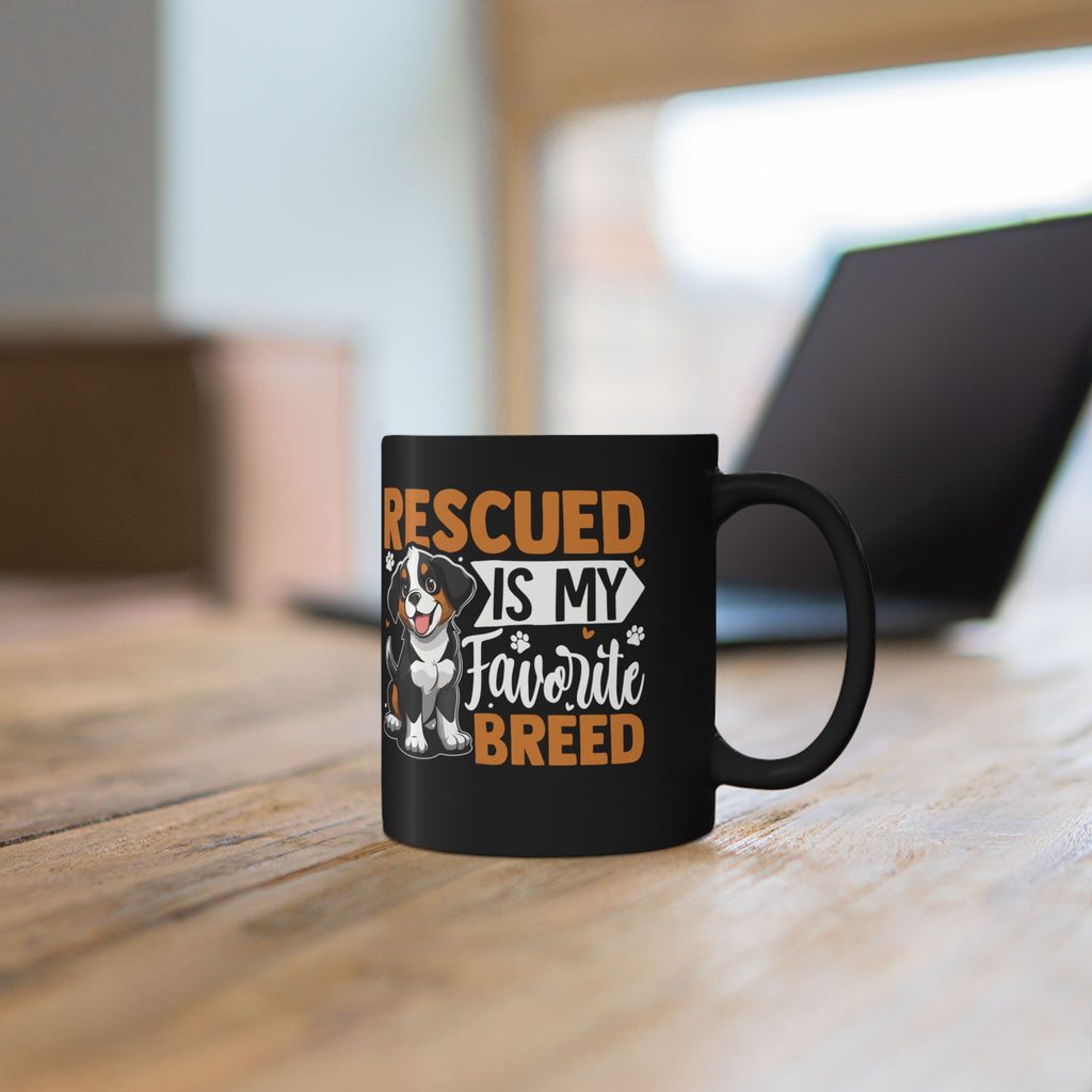Close-up of Rescued is My Favourite Breed quote design on personalised black ceramic mug