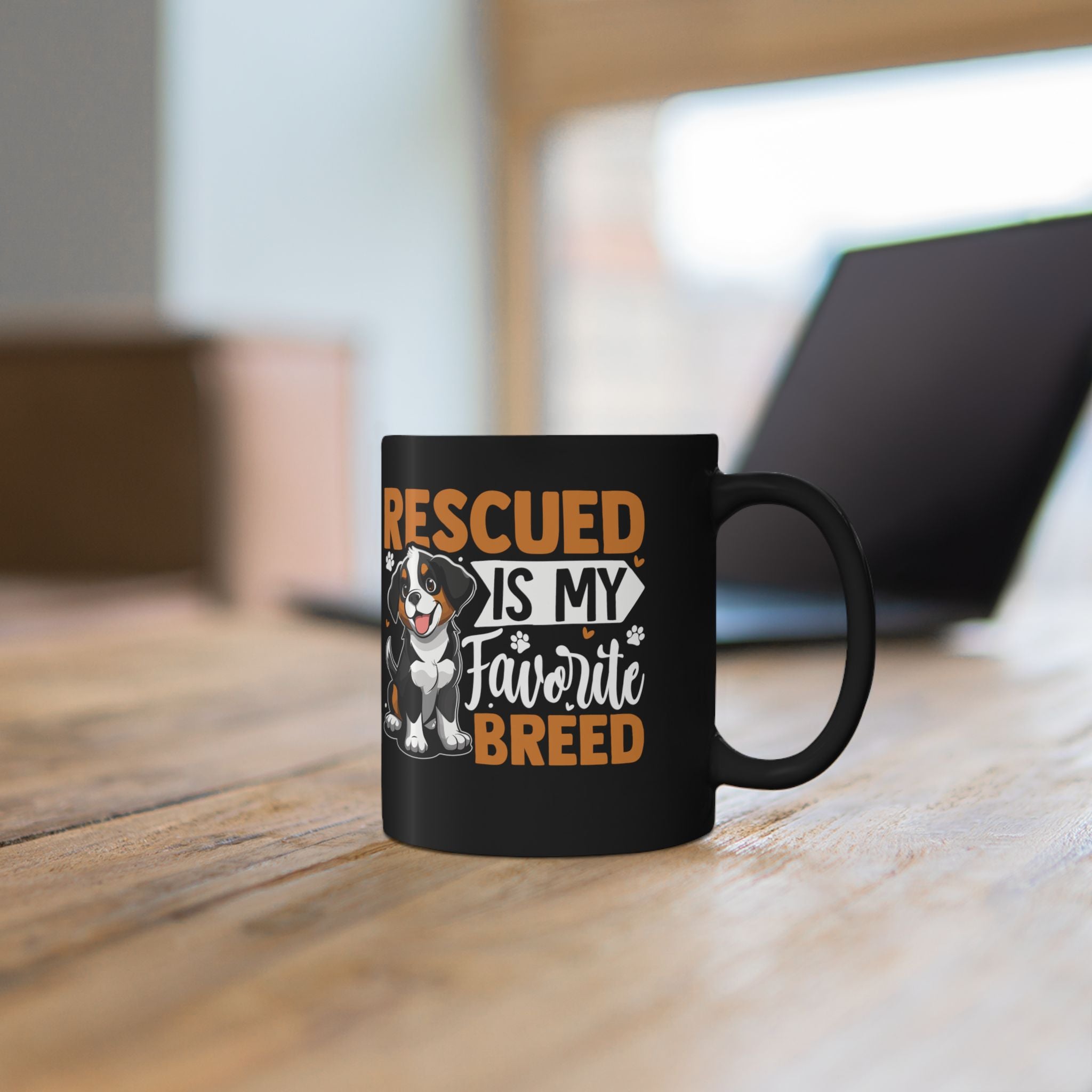 Close-up of Rescued is My Favourite Breed quote design on personalised black ceramic mug