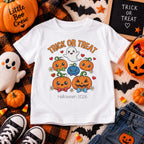 Boy wearing Trick or Treat kawaii pumpkin Halloween t-shirt