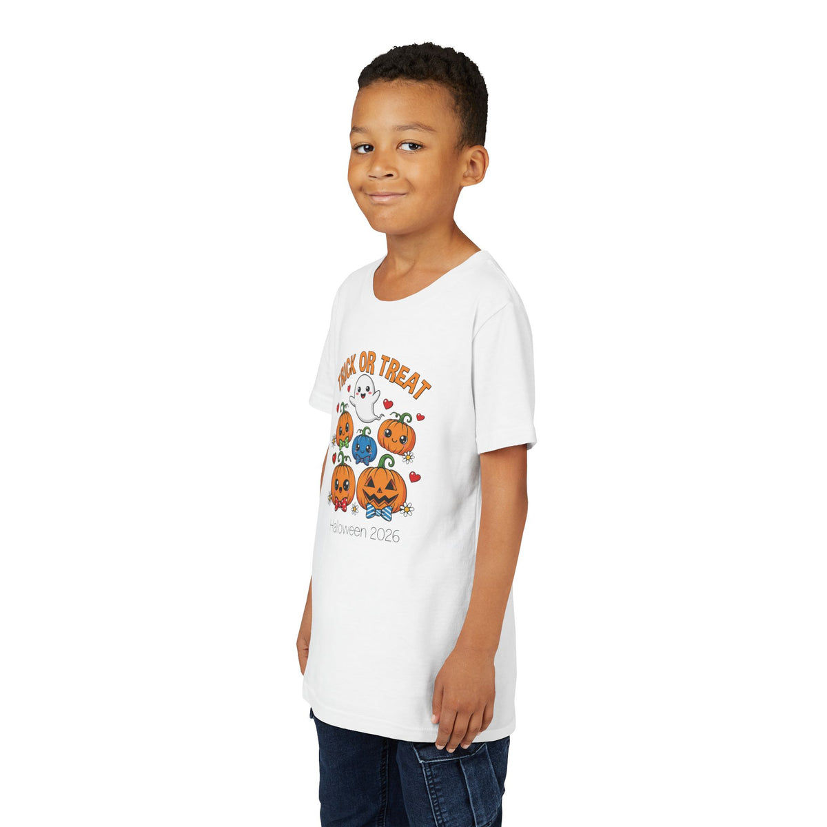 Close-up of kawaii pumpkin and ghost graphic on kids Halloween tee