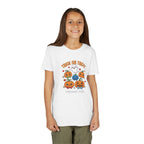 Girl wearing Trick or Treat kawaii pumpkin Halloween t-shirt