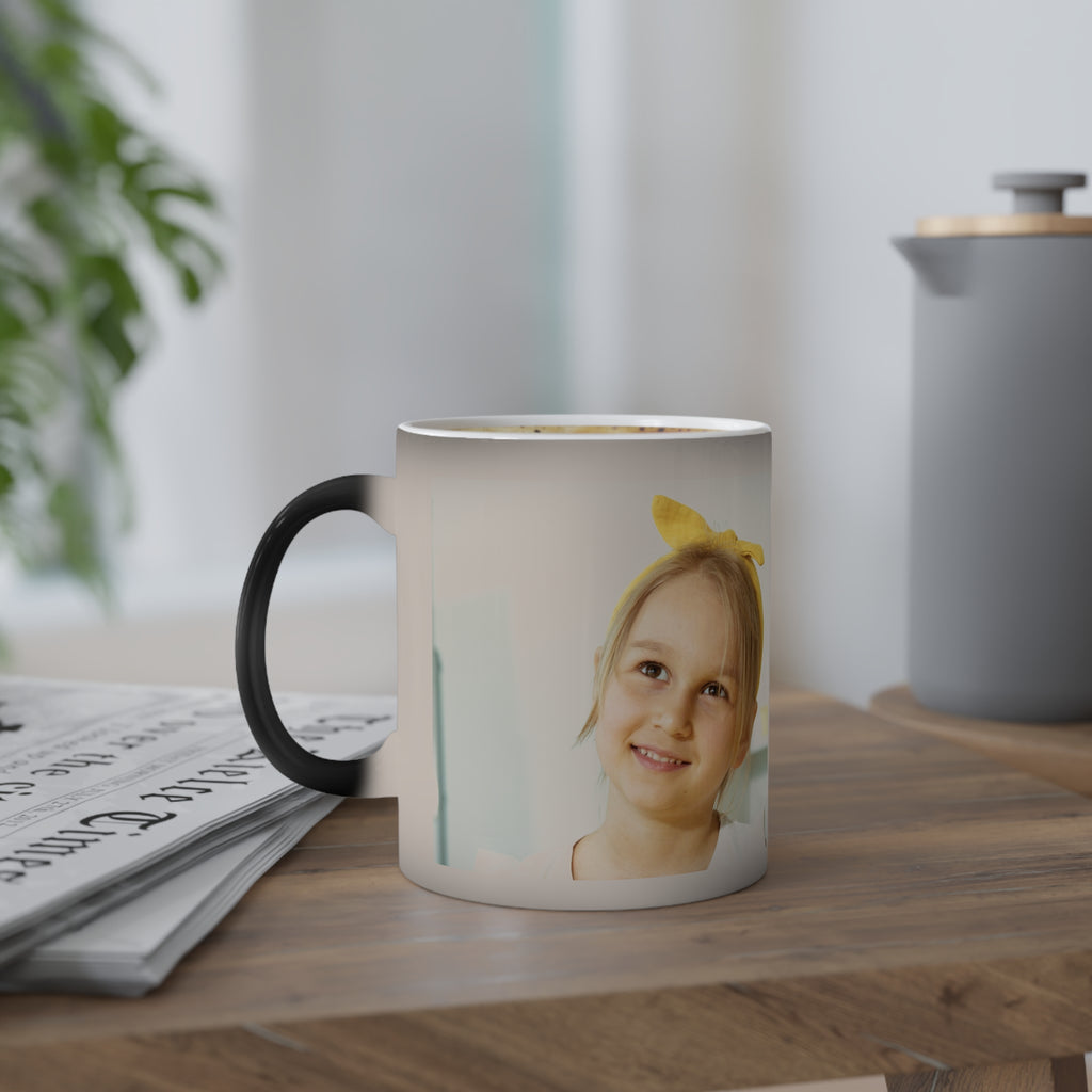 Custom two-photo magic mug showing second photo revealed by heat